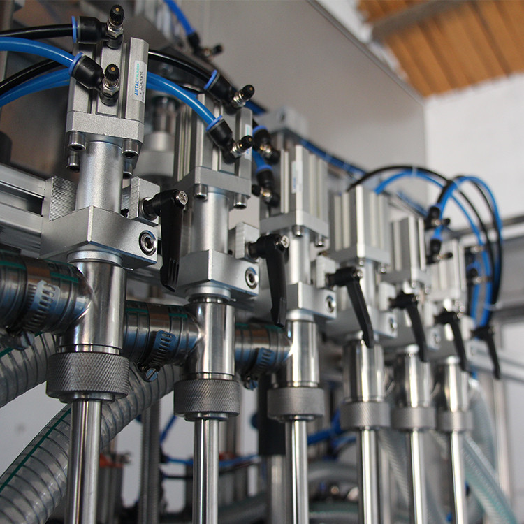 तेल की बोतल भरने की मशीन